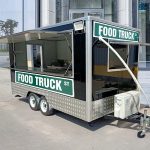 Modern mobile food trailer equipped with advanced cooking equipment and serving amenities
