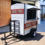 High-capacity mobile kitchen trailer with insulated interiors, easy access doors, and efficient cooking systems