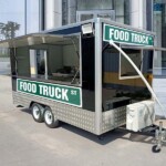 Modern mobile food trailer equipped with advanced cooking equipment and serving amenities
