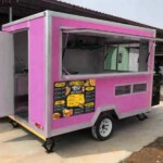 Industrial catering mobile kitchen designed for large-scale food production, featuring robust construction and safety features